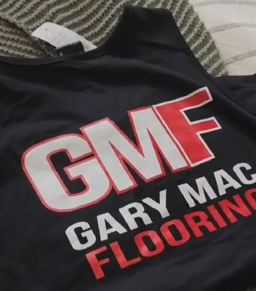 GMF Gary Mac Flooring singlet laid flat